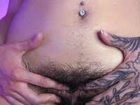 Less showing all her tattoos