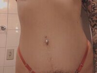 Less showing all her tattoos