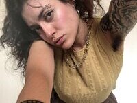 Less showing all her tattoos