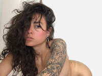 Less showing all her tattoos