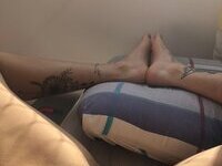 Less showing all her tattoos