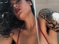 Less showing all her tattoos