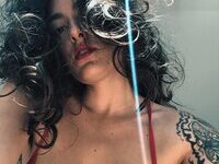 Less showing all her tattoos