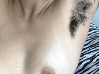 Less showing all her tattoos