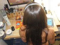 Cute brunette playing video games naked at home