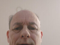 Michel dube face wirh ID card and address exposed