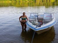 Young wife flashing on boat