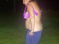 Young wife flashing on boat