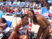 Two amateurs girl topless shot on the beach