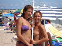 Two amateurs girl topless shot on the beach