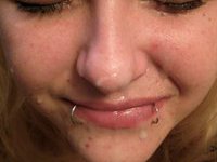 Tattooed blonde sucking deep