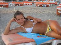 Young amateur nude girl on holiday