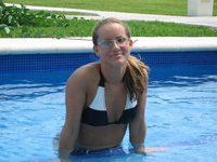 Nerdy babe in the pool