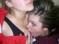 College girls kissing on the lips