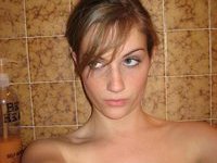 Very pretty babe taking a shower