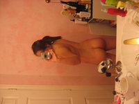 Naked in front of the mirror