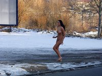 Naked outdoors on a winter day