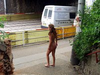 Nude chick in a public place