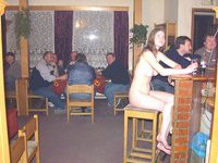 Nude babe in the bar