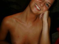 Nude and smiling