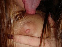 Licking my hard nipples