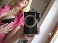 Nude blonde taking self pics