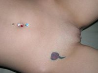 Her tit is tattooed