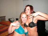 Two lusty babes teasing