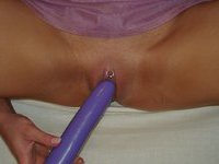 Long purple dildo for her cunt
