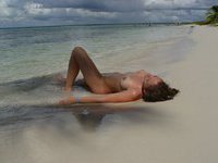 Posing nude by the ocean