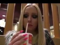 Blonde sucks cock in a cafe and gets cum in her mouth