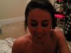 Cute naked latina gives a blowjob and gets cum on her face