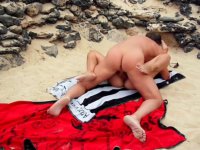 Sex with a young girlfriend on the beach
