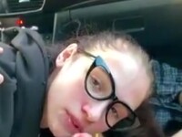 Young brunette with glasses and POV blowjob in the car