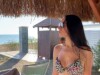 Naughty girl sucks cock, risking being caught on the beach